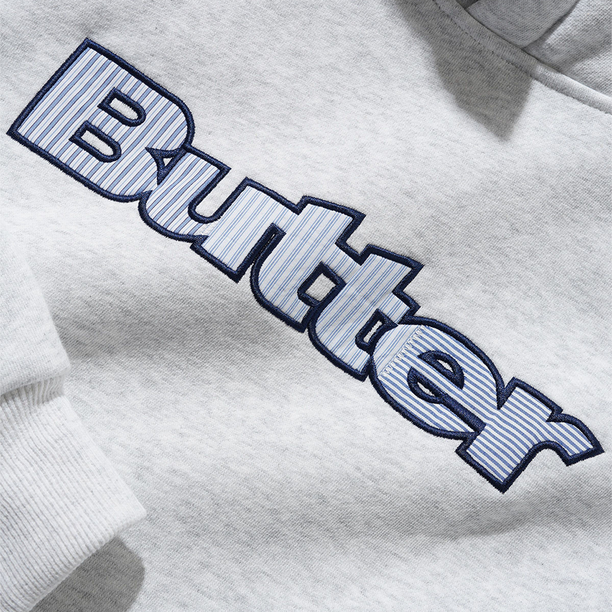 Butter Stripe Logo Applique Pullover Hood Ash