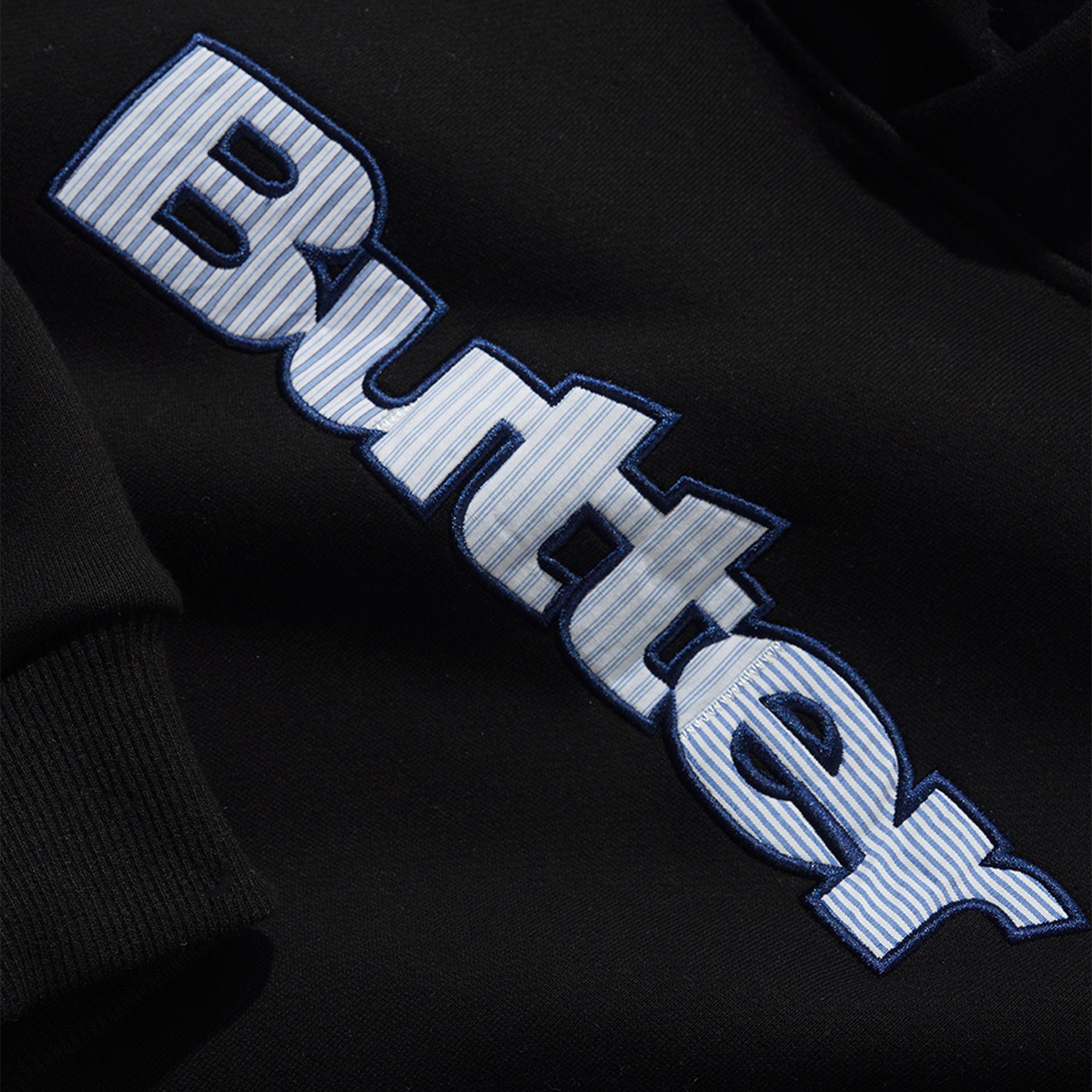Butter Stripe Logo Applique Pullover Hood Black